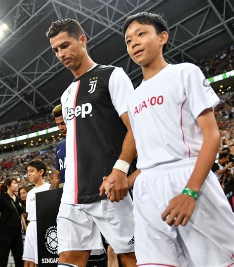 Cristiano Ronaldo Fans In Asia Attempt To Get Close To Him With Wildly ...