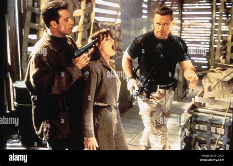 Operation: Broken Arrow / John Travolta / Samantha Mathis / Howie Long Stock Photo - Alamy