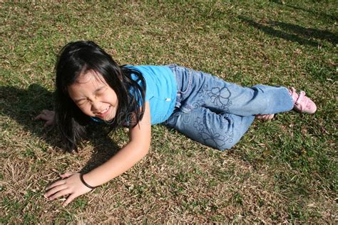 Girl falling off. Little girl falling off at the park on sunny day #Sponsored , #AD, #AD, # ...