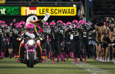 Oregon rolls past Washington State wearing awesome pink uniforms for breast cancer awareness ...