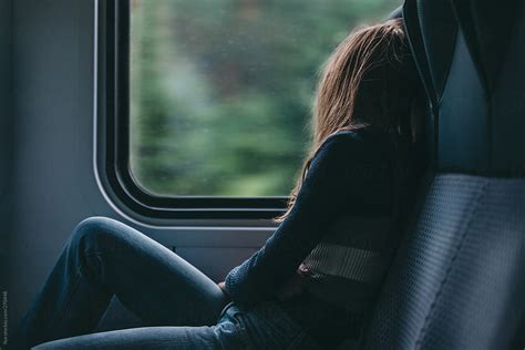 "Young Woman Travel Train" by Stocksy Contributor "Ilya" - Stocksy