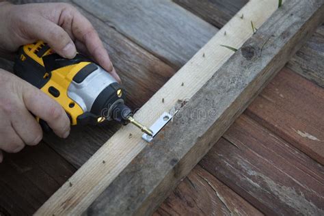 Carpenter Hand and Power Drill Stock Photo - Image of electronic, handyman: 189838636