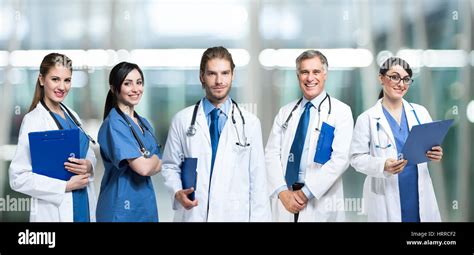 Group of smiling doctors Stock Photo - Alamy