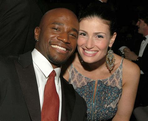 Idina Menzel And Taye Diggs Kiss