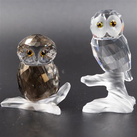 Sold at Auction: Swarovski Crystal Owl Figurines