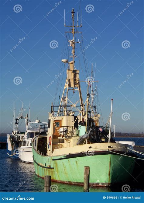 Green Fishing Boat in Harbor Stock Image - Image of fishing, fisher ...