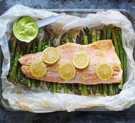 Poached salmon & asparagus with wild garlic mayonnaise recipe | BBC Good Food