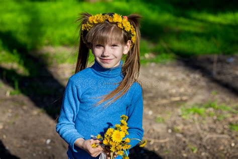 Little Girl on a Green Grass in a Wreath of Flowers in Spring Stock Photo - Image of caucasian ...