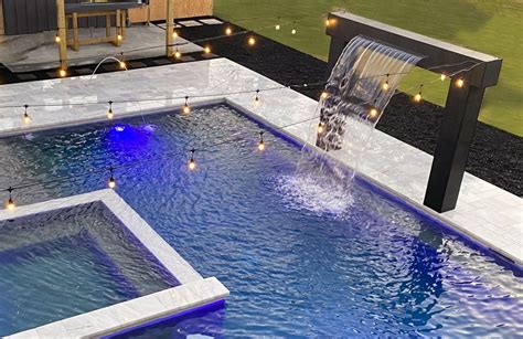 10 Swimming Pool Water Feature Ideas (Besides Rock Waterfalls) (2022)