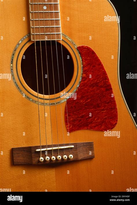 Detail of an acoustic guitar body Stock Photo - Alamy