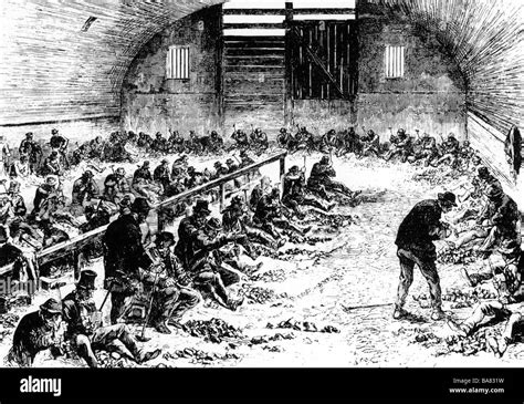 WORKHOUSE Paupers breaking stones in a British workhouse in the Stock ...