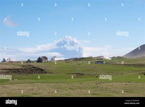 Eyjafjallajökull ash cloud in the background of the Heimaey Island ...