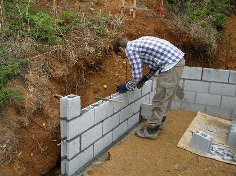 Concrete block wall construction, for retaining wall or extension ...