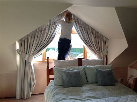 Dressing a pair of Triple pleat pitched dorma window curtains using LA ...