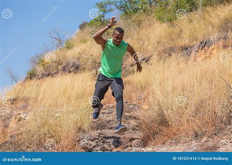 African Man Trail Running in Meadow on Mountain Outdoor. Sport ...