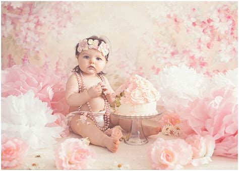 A vintage rose cake smash first birthday studio baby portrait with Rhode Island photographers of ...