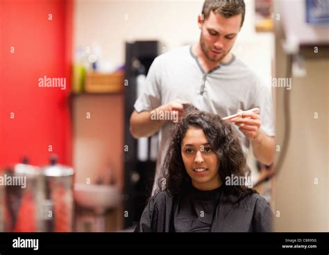 Man combing hair Stock Photo - Alamy