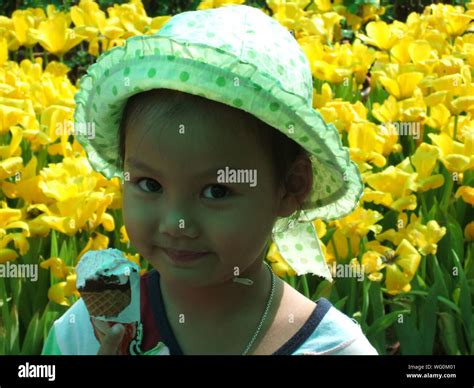 Indian girl eating ice cream hi-res stock photography and images - Alamy