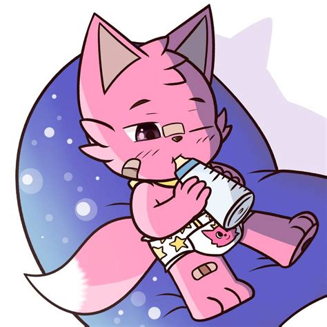 a pink cat drinking from a bottle on top of a pillow