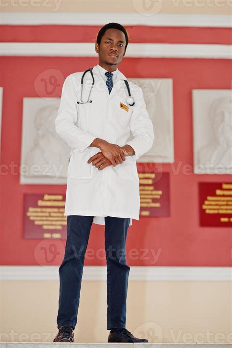 Stylish african american doctor with stethoscope posed indoor. 10413615 Stock Photo at Vecteezy