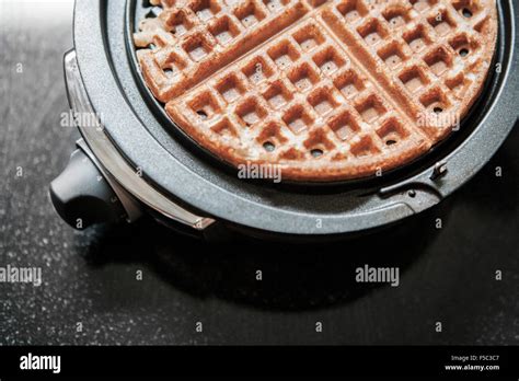 Waffle and Waffle Iron Stock Photo - Alamy