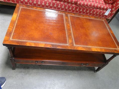Sold Price: Wood & Leather Coffee Table - May 4, 0120 9:30 AM CDT
