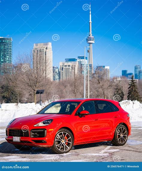 Red Porsche Cayenne in a Parking Low on a Sunny Day during the Winter Editorial Photo - Image of ...