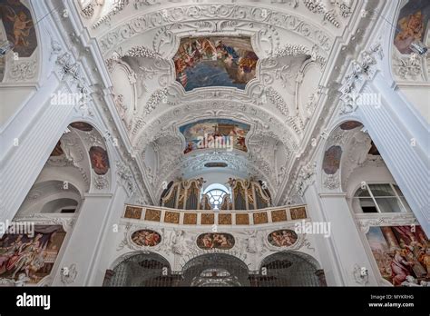 Interior view with organ gallery and ceiling frescoes and stucco, Basilica St. Quirin, monastery ...