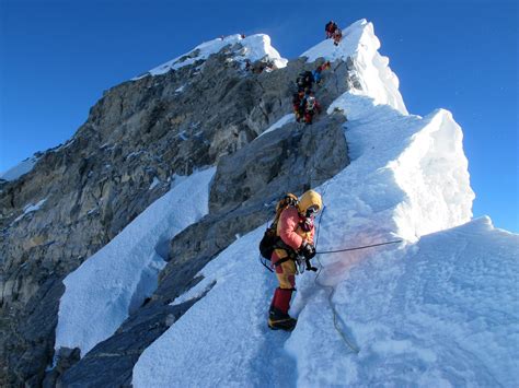 Summiting Everest is about determination and enduring risk and fatigue ...