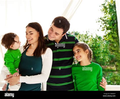 Portrait of a happy smiling family Stock Photo - Alamy