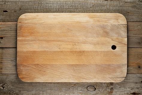 Chopping board on wooden background | High-Quality Food Images ...