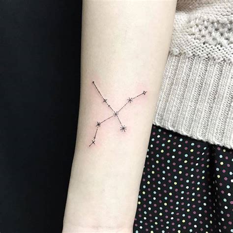 Cygnus constellation (northern cross) tattoo on the