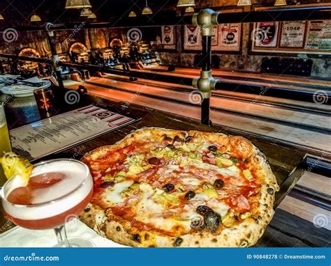 Snack at the bowling stock photo. Image of food, pizza - 90848278