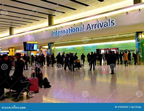 International Arrivals at Heathrow Editorial Photography - Image of ...