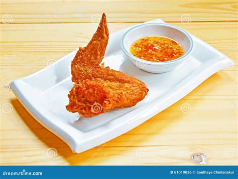 One Fried Chicken-wing in White Ceramic Dish Stock Photo - Image of ...