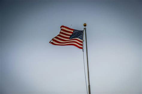 Silhouette of Four Person With Flag of United States Background · Free Stock Photo