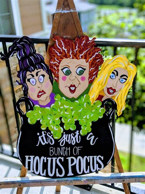Hocus Pocus Halloween Door Hanger | Halloween door hangers, Halloween door, Hocus pocus decorations