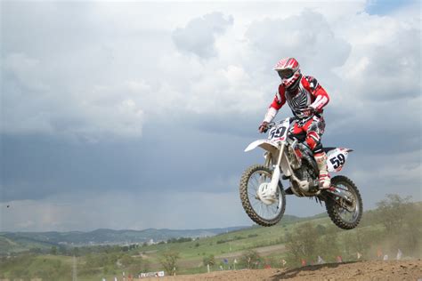 Free Images : cloud, sky, jump, red, vehicle, extreme sport, moped ...