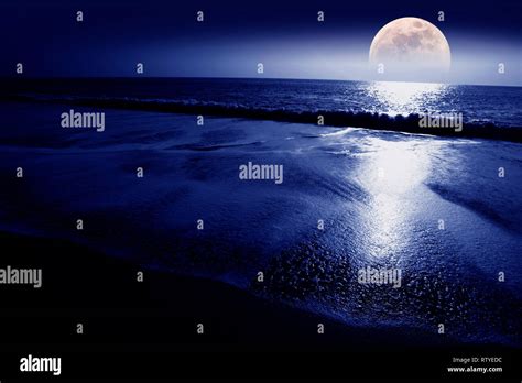 awesome,amazing,big,biggest,colossal, rise, setting, set, moonrise, moonset, over sea, beach ...