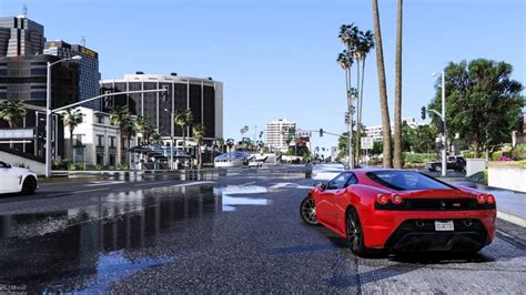 a red sports car driving down a wet street next to tall buildings and ...