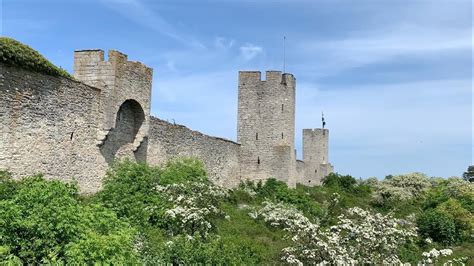 Relaxing walk along the medieval city wall of Visby, Sweden. Classical ...