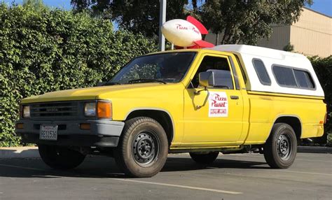 PHOTOS: Fan-made Pizza Planet truck looks like it drove right out of "Toy Story" - Inside the Magic