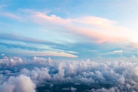 Premium Photo | Blue sky with the clouds from the plane view