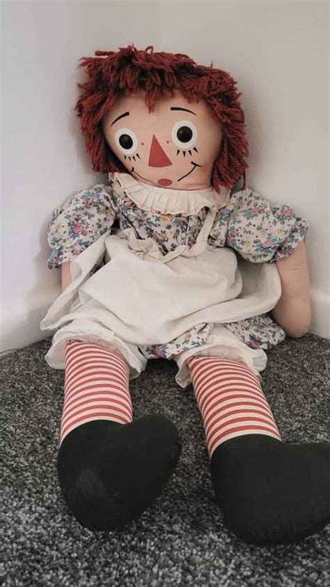 Couple believe their Annabelle doll is possessed after CCTV shows it emerged from its display ...