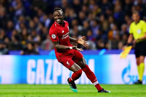 Sadio Mane of Liverpool celebrates scoring the opening goal during ...