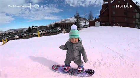 Toddler tears up slopes on her snowboard - YouTube