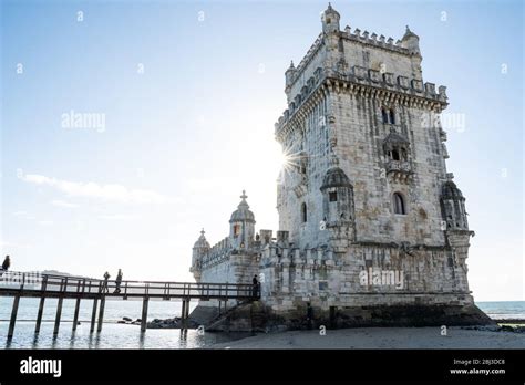 Torre de Belem in the sunlight - backlight, blue sky - Lisbon Stock Photo - Alamy