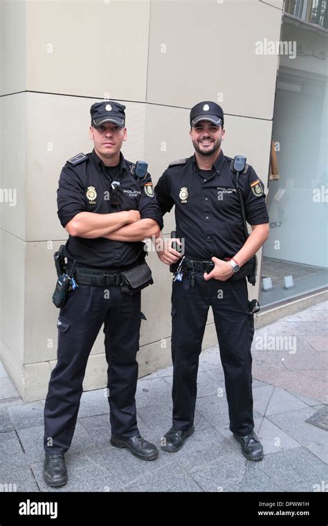 Two National Police Force Police officers (Policia Cuerpo Nacional de Policía or CNP) Seville ...