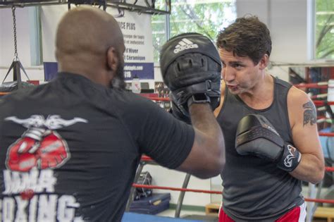 Canadian PM Justin Trudeau shows off huge tattoo during COVID vaccination