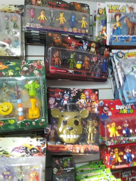 Fnaf bootlegs I found at a bootleg store in Ecuador | Five Nights At Freddy's Amino